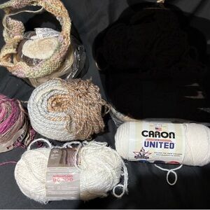 5 skeins of yarn. Lion’s brand, Caron, Hygge, Yarnspirations.